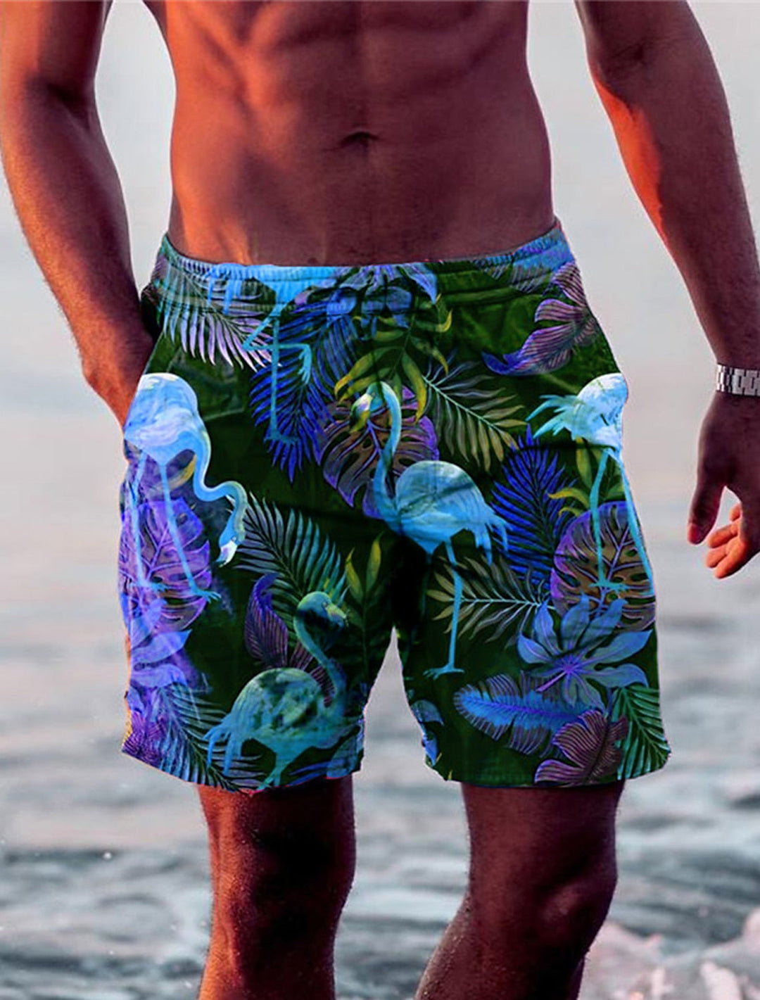 Pantaloncini da bagno da uomo con un'accattivante fantasia a fenicotteri - eleganti e distintivi sulla spiaggia
