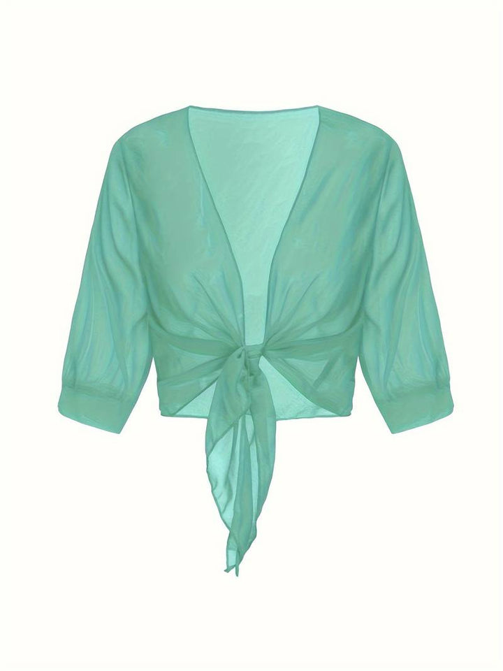 <div>Katie – Blusa Elegante con Apertura Fresca sul Davanti</div>