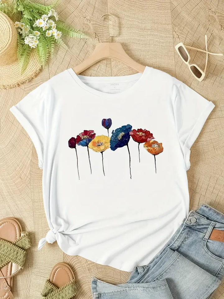 Elegante T-shirt bianca da donna con stampa floreale - perfetta per le calde giornate estive