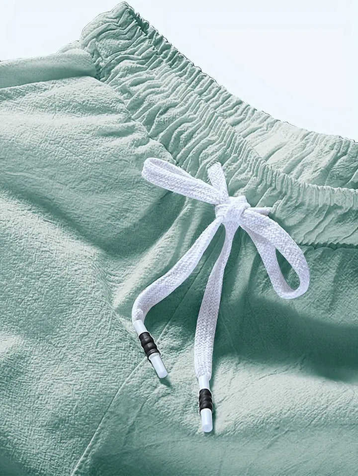 Eleganti pantaloncini estivi da uomo con cordoncino regolabile e struttura morbida e confortevole per ogni uomo