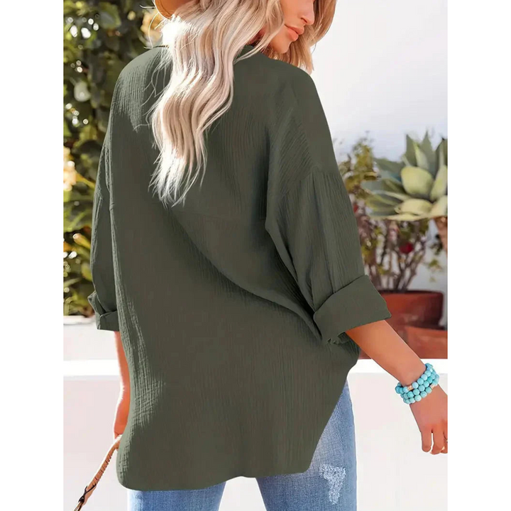 Elegante camicia da donna a maniche lunghe con chiusura classica a bottoni