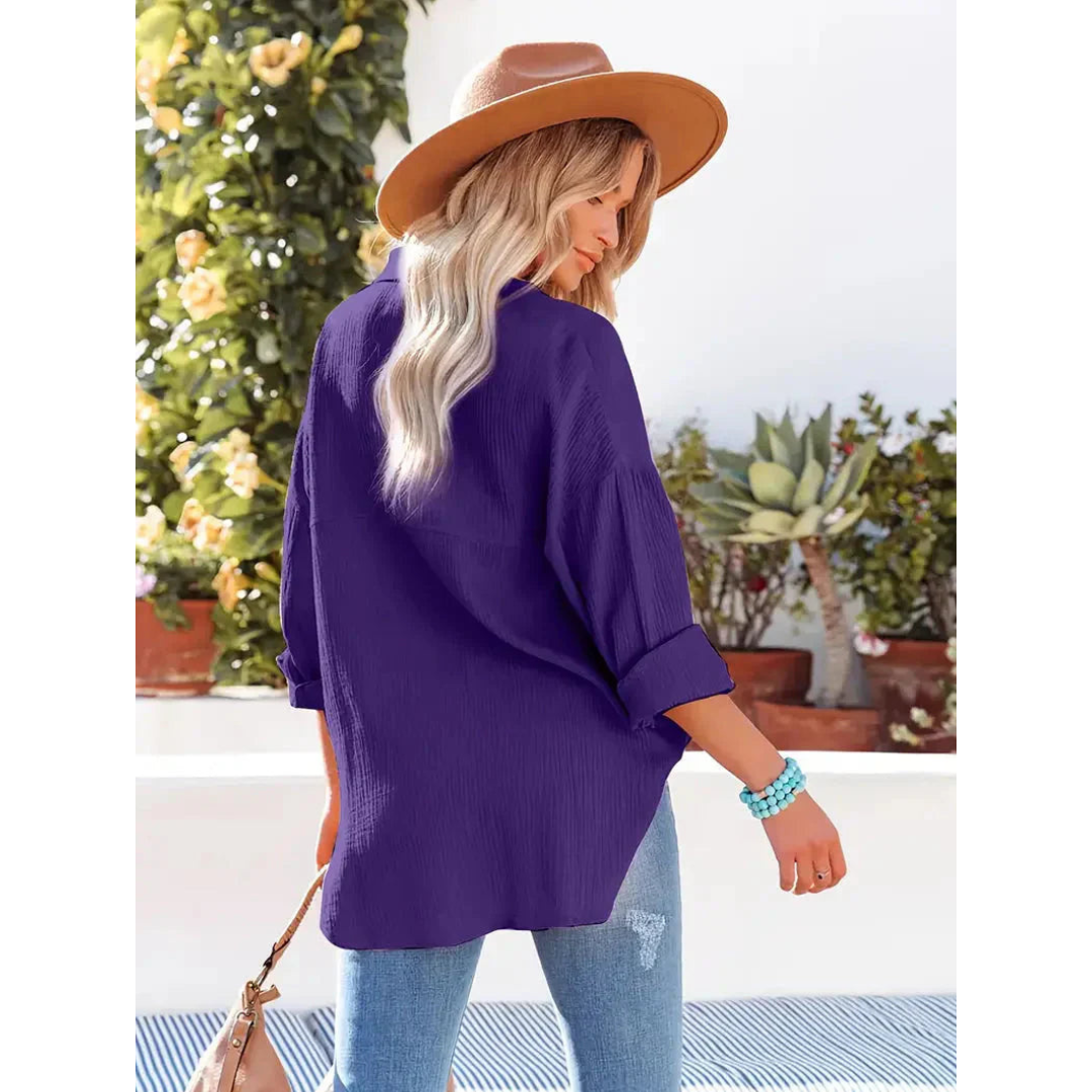 Elegante camicia da donna a maniche lunghe con chiusura classica a bottoni