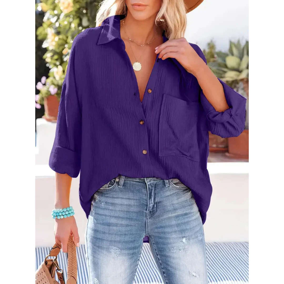 Elegante camicia da donna a maniche lunghe con chiusura classica a bottoni