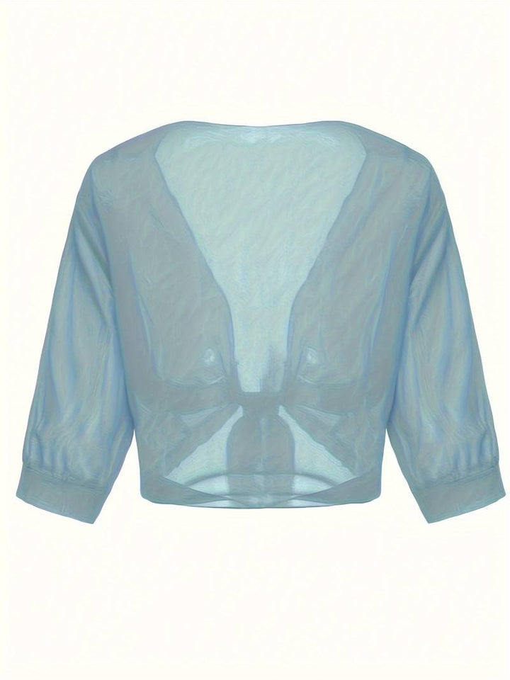 <div>Katie – Blusa Elegante con Apertura Fresca sul Davanti</div>