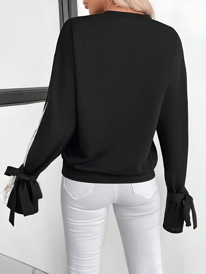 Elodie - Trendy Colour Block Sweatshirt met Elegant Bloemenkant