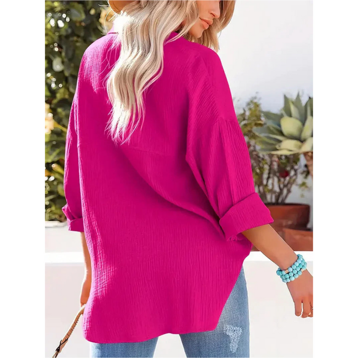 Elegante camicia da donna a maniche lunghe con chiusura classica a bottoni