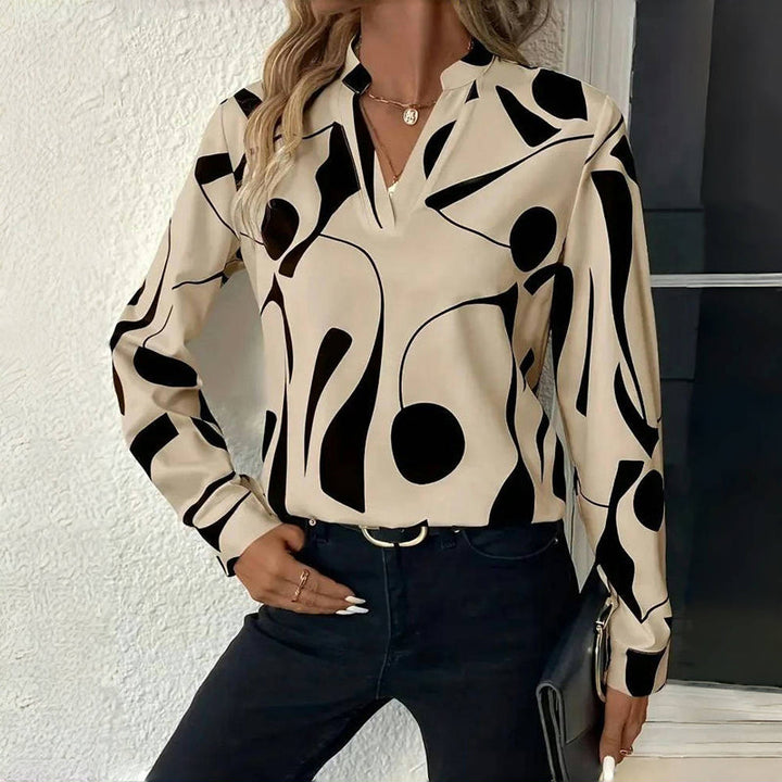 <html><body><p>Izora - Blusa Chic per Donne</p></body></html>