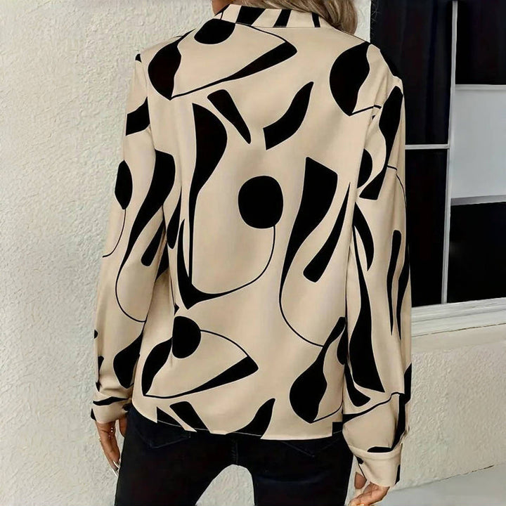 <html><body><p>Izora - Blusa Chic per Donne</p></body></html>