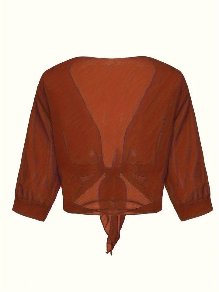 <div>Katie – Blusa Elegante con Apertura Fresca sul Davanti</div>