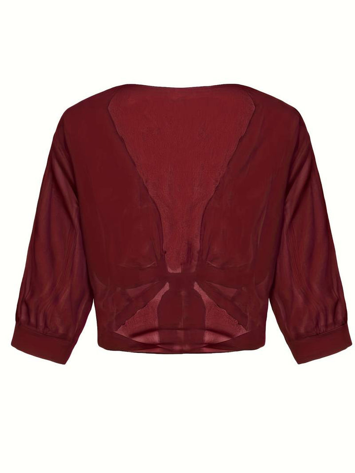 <div>Katie – Blusa Elegante con Apertura Fresca sul Davanti</div>