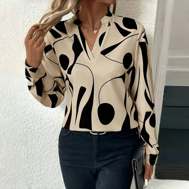 <html><body><p>Izora - Blusa Chic per Donne</p></body></html>