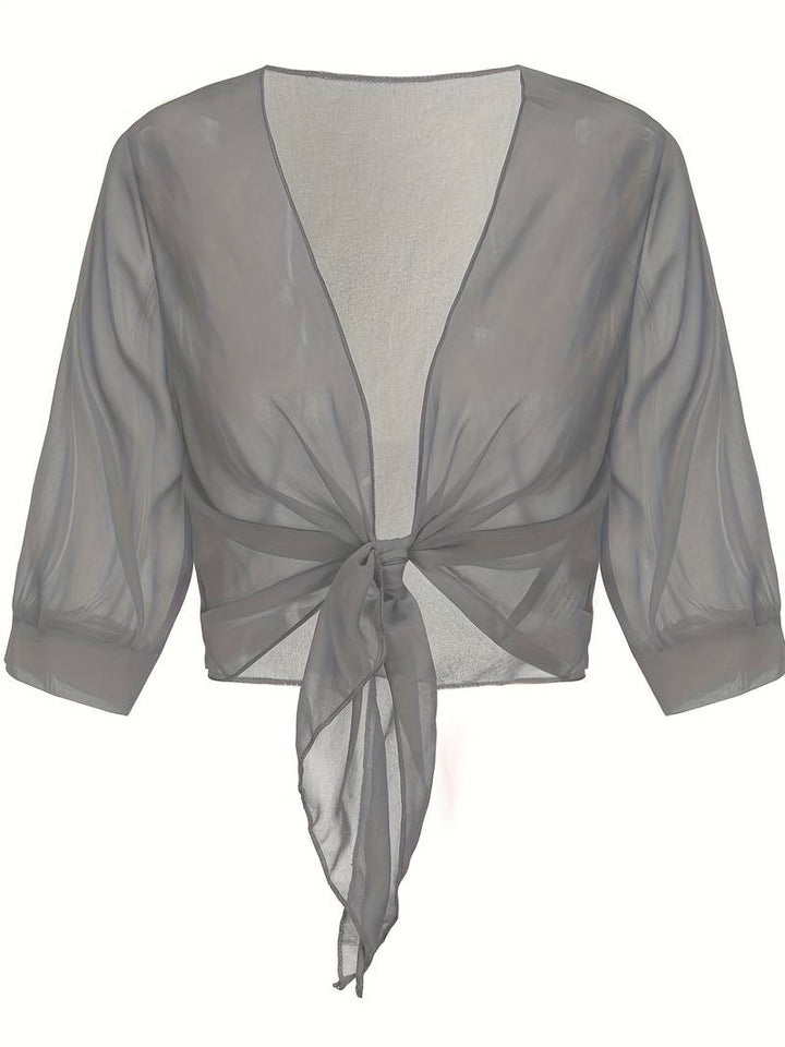 <div>Katie – Blusa Elegante con Apertura Fresca sul Davanti</div>