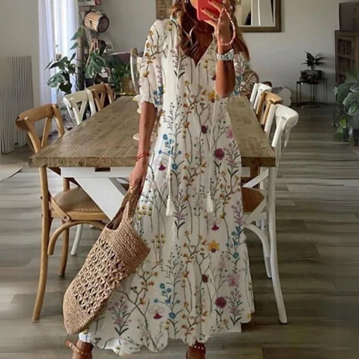 <html>
<head>
</head>
<body>
<p>Lotte - Elegante Maxi Abito con Fantasia di Fiori Vibranti</p>
</body>
</html>