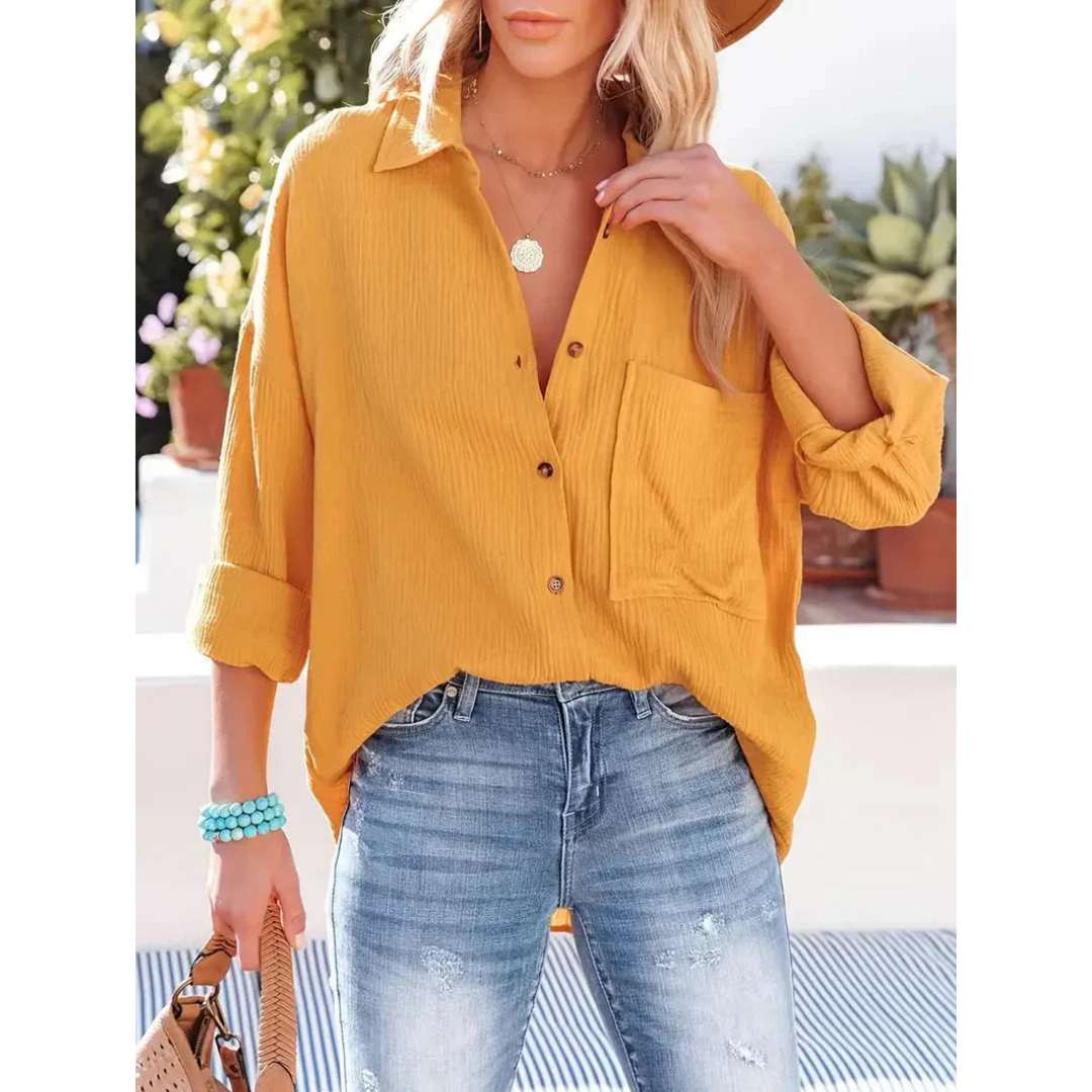 Elegante camicia da donna a maniche lunghe con chiusura classica a bottoni