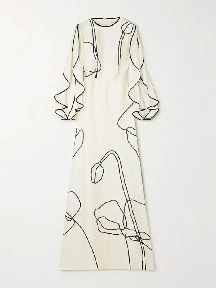 <p>Eline - Abito da sera chic con eleganti maniche arricciate e stampa floreale.</p>