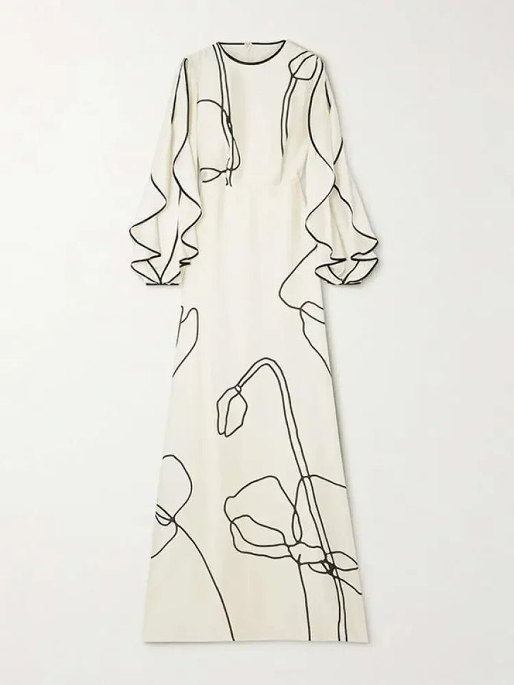 <p>Eline - Abito da sera chic con eleganti maniche arricciate e stampa floreale.</p>