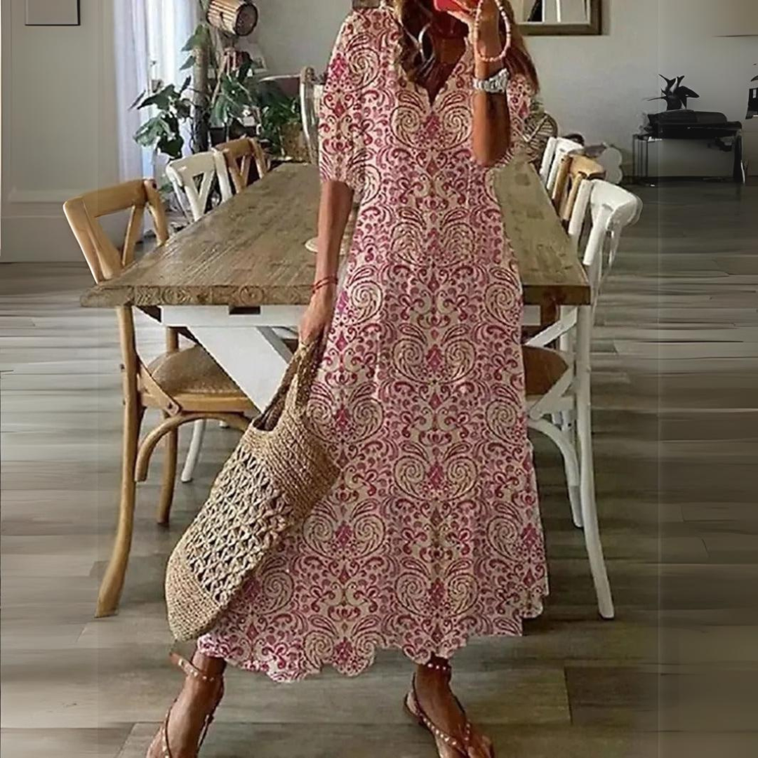 <html>
<head>
</head>
<body>
<p>Lotte - Elegante Maxi Abito con Fantasia di Fiori Vibranti</p>
</body>
</html>
