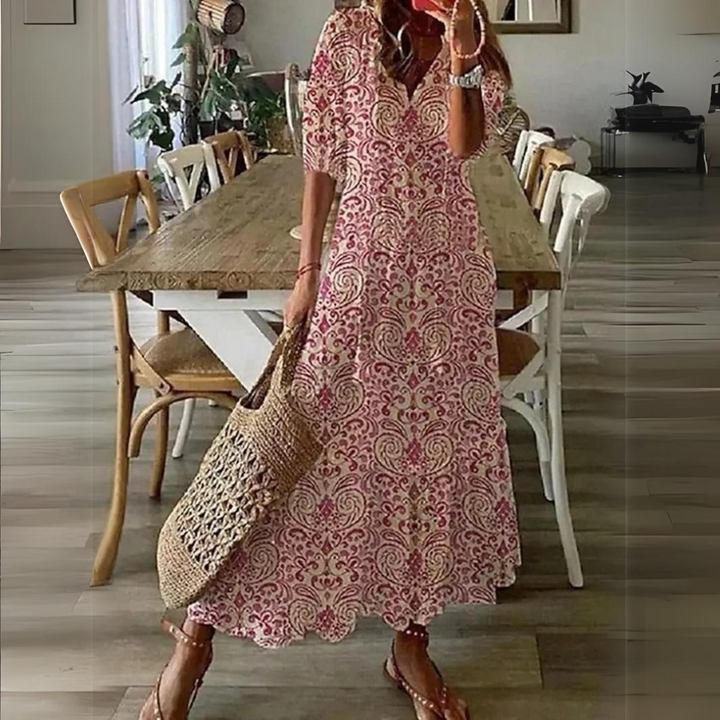 <html>
<head>
</head>
<body>
<p>Lotte - Elegante Maxi Abito con Fantasia di Fiori Vibranti</p>
</body>
</html>