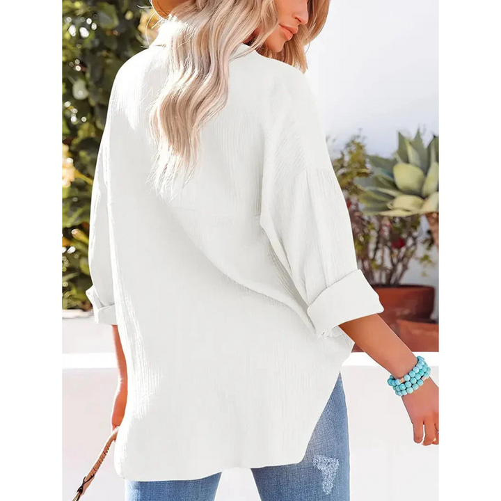Elegante camicia da donna a maniche lunghe con chiusura classica a bottoni