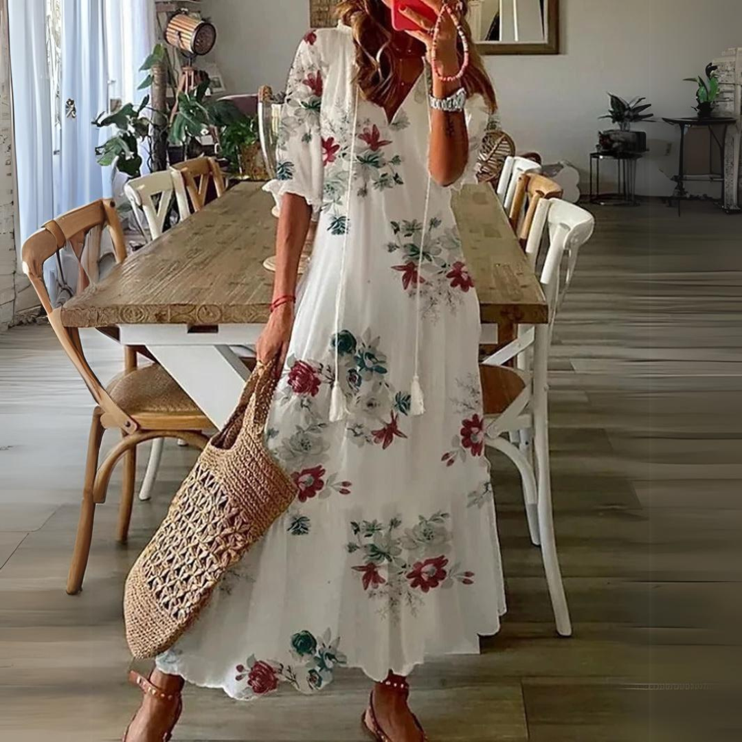 <html>
<head>
</head>
<body>
<p>Lotte - Elegante Maxi Abito con Fantasia di Fiori Vibranti</p>
</body>
</html>