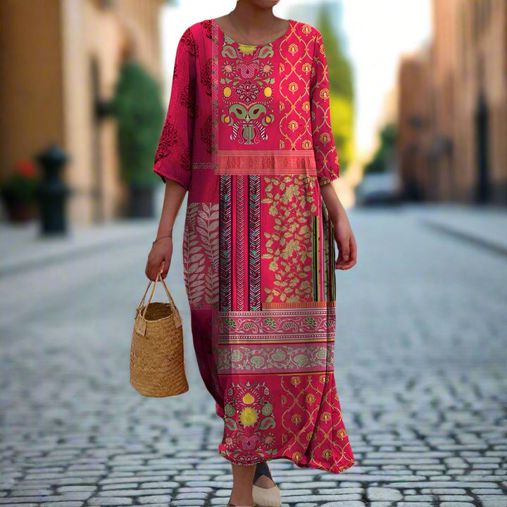 <html>
  <body>
    <p>Noëmie - Elegante Abito Maxi Etnico per un Look Fluido</p>
  </body>
</html>