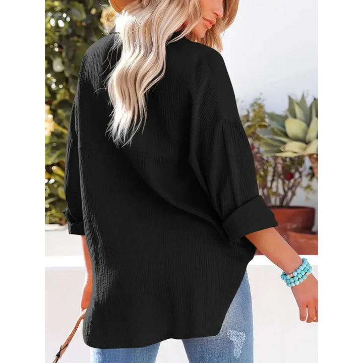 Elegante camicia da donna a maniche lunghe con chiusura classica a bottoni