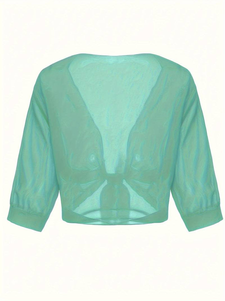 <div>Katie – Blusa Elegante con Apertura Fresca sul Davanti</div>
