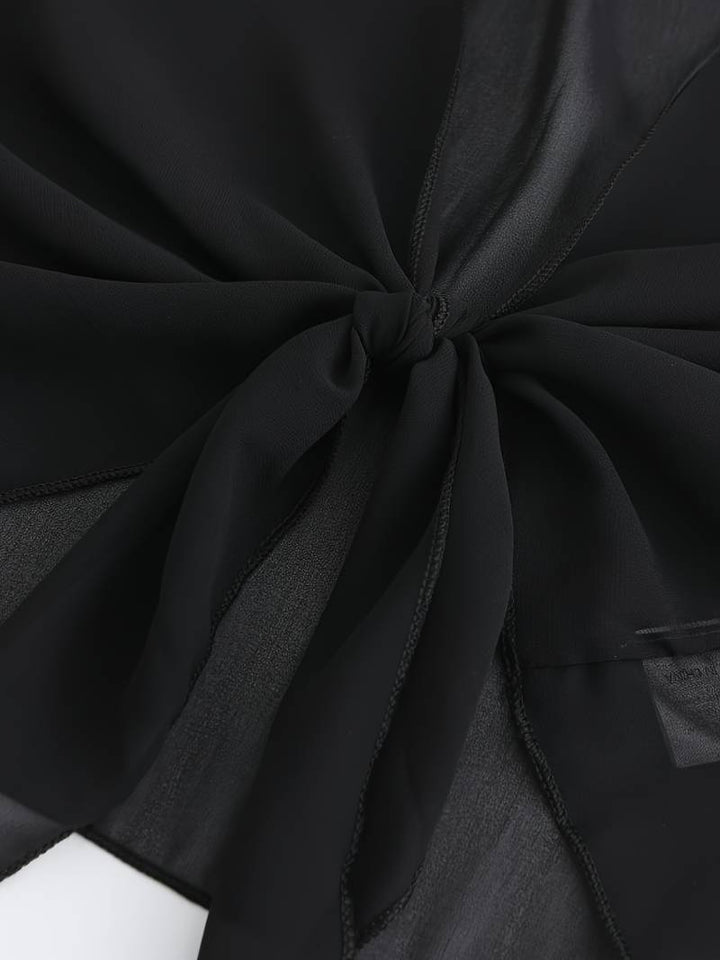 <div>Katie – Blusa Elegante con Apertura Fresca sul Davanti</div>
