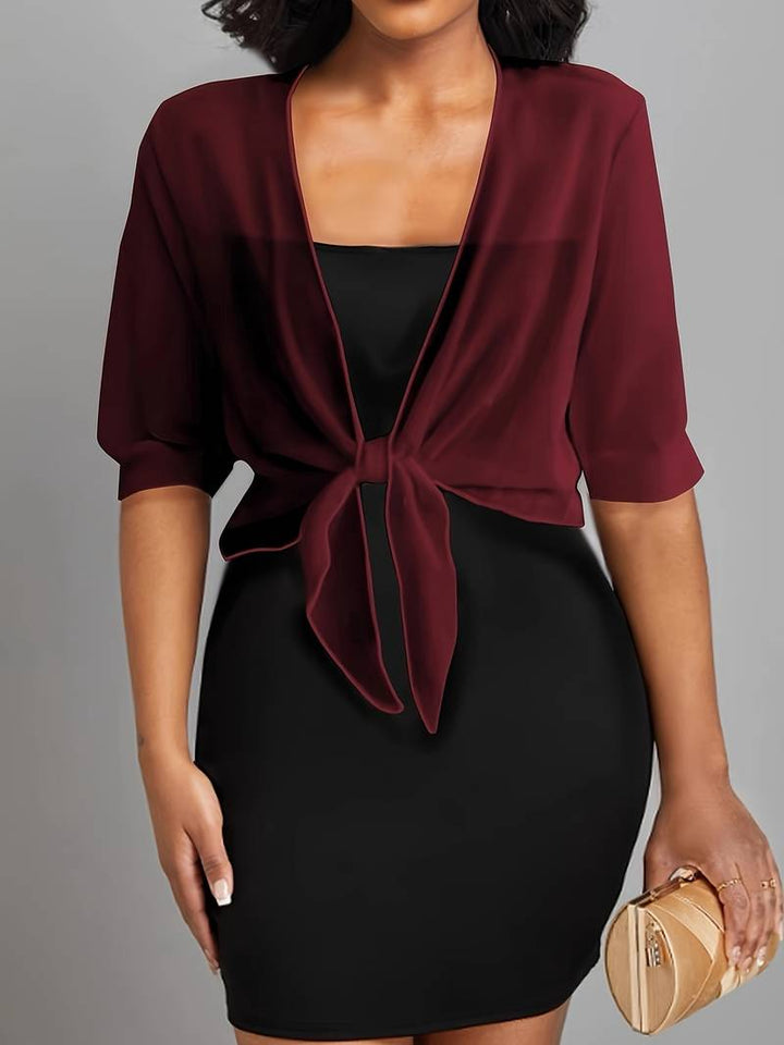 <div>Katie – Blusa Elegante con Apertura Fresca sul Davanti</div>