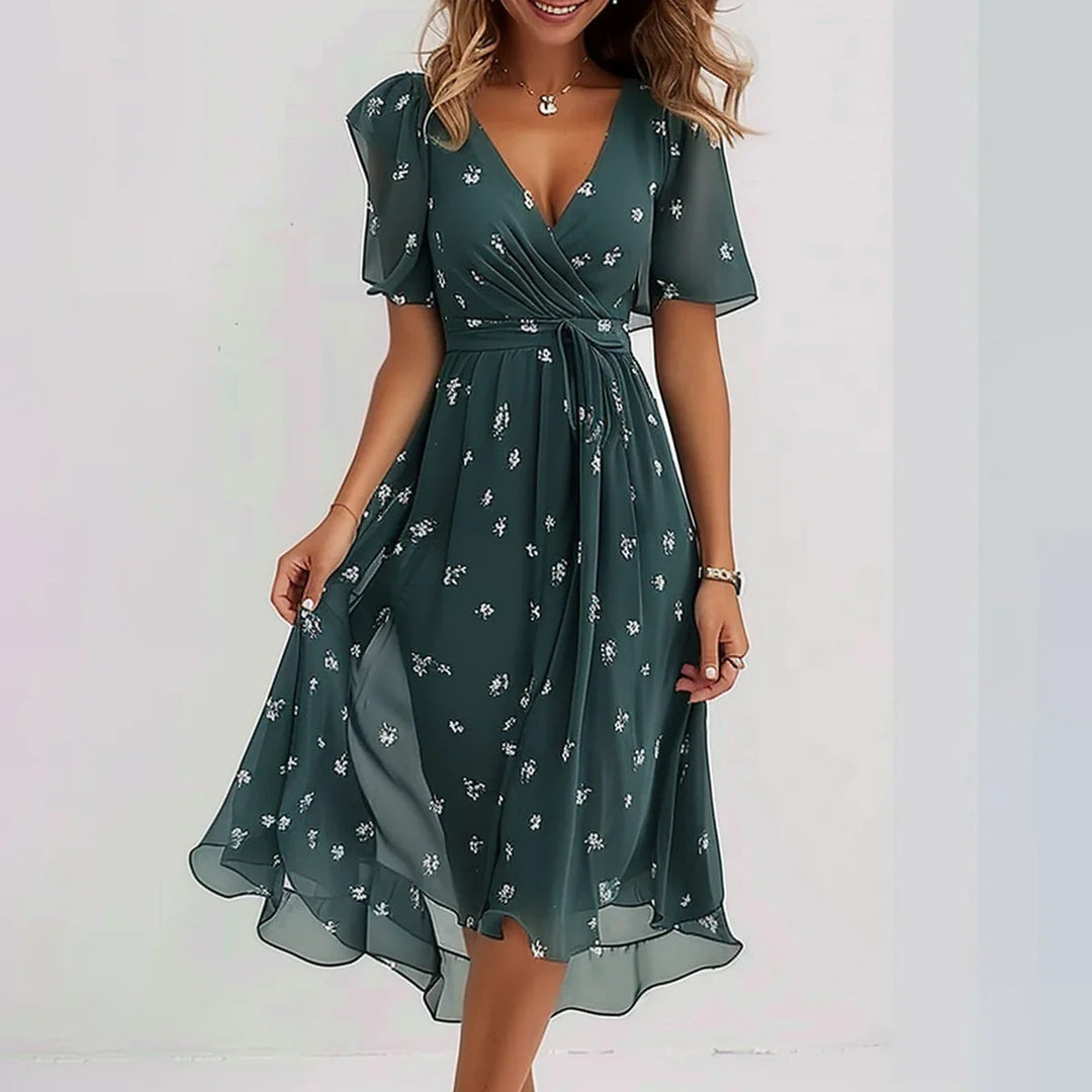 <div>Odilia - Elegante abito midi avvolgente con stampa alla moda</div>