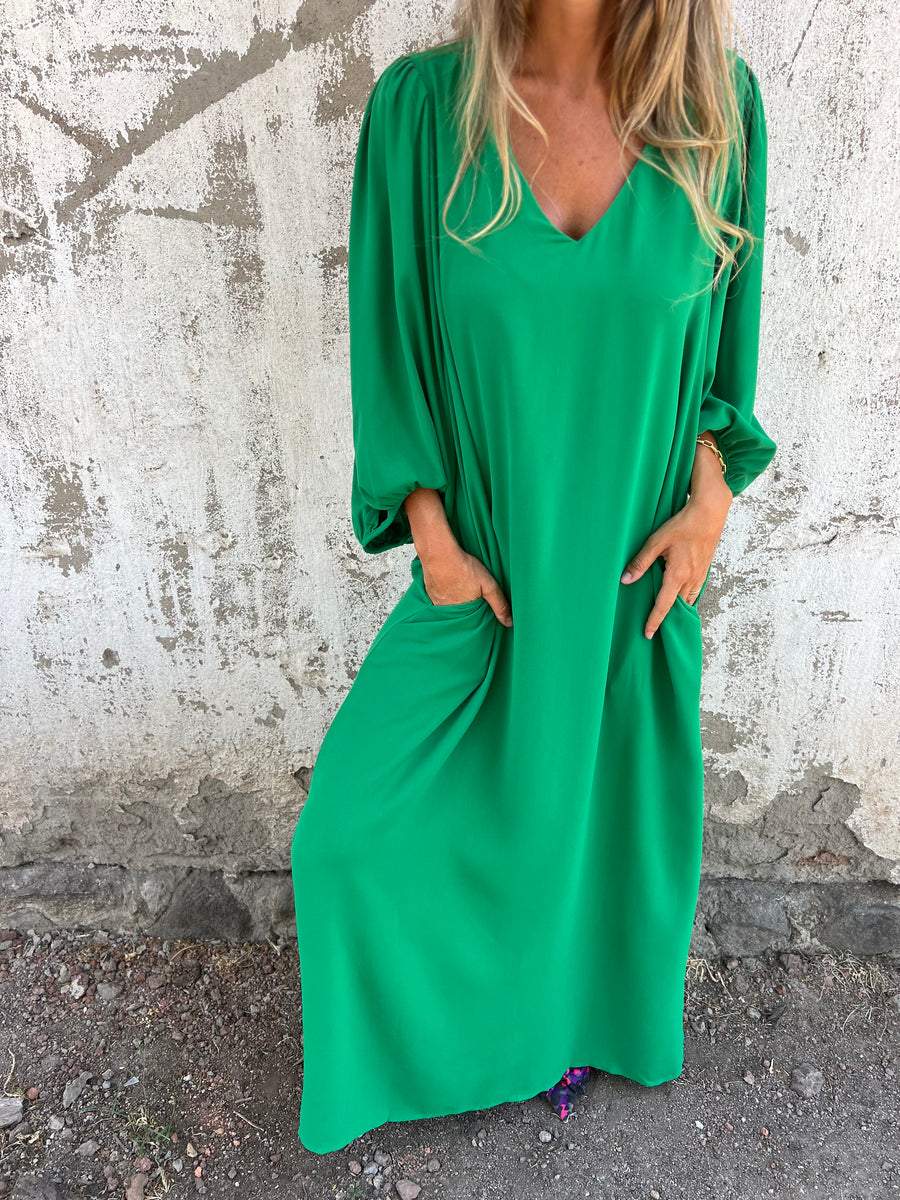 Maxi abito da donna elegante con scollatura a punta - ideale per le occasioni speciali
