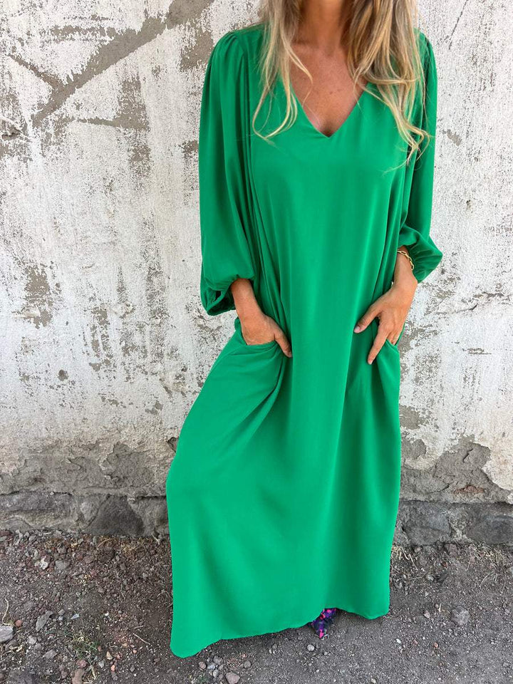 Maxi abito da donna elegante con scollatura a punta - ideale per le occasioni speciali