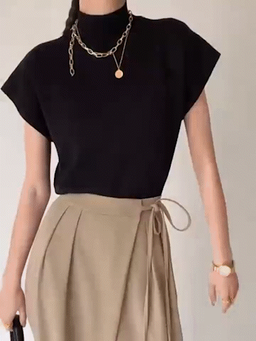 <html><body><p>Ismara - Top Elegante con Collo Alto Chic</p></body></html>