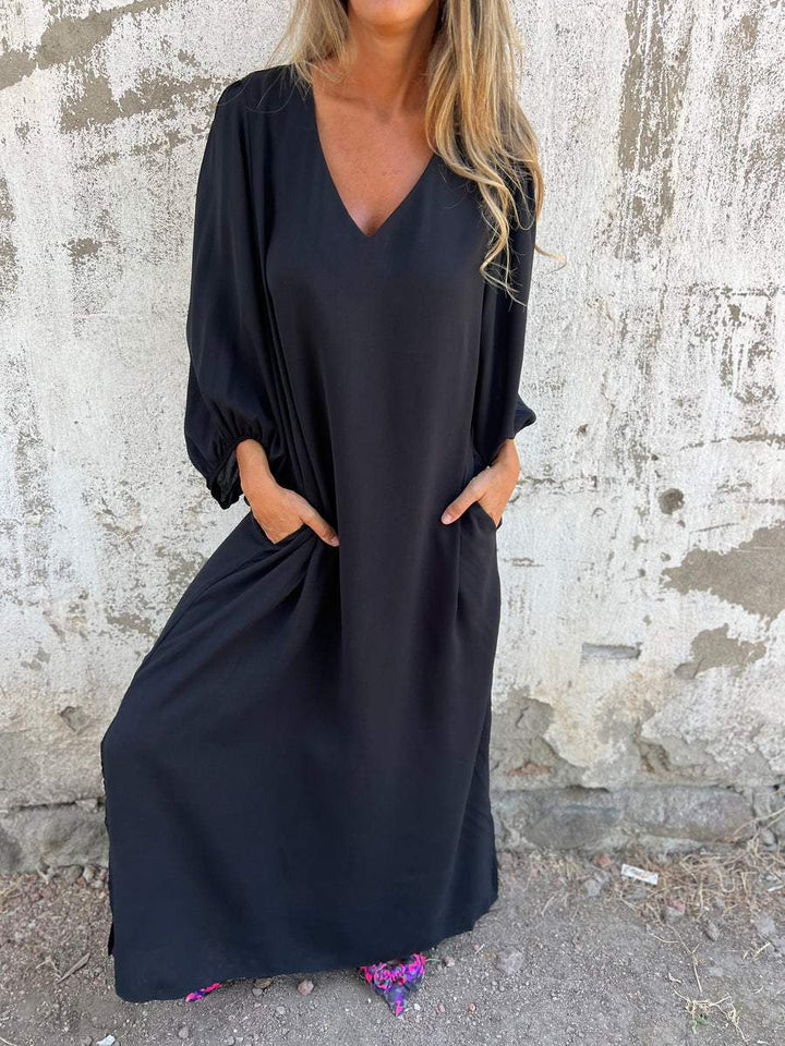 Maxi abito da donna elegante con scollatura a punta - ideale per le occasioni speciali