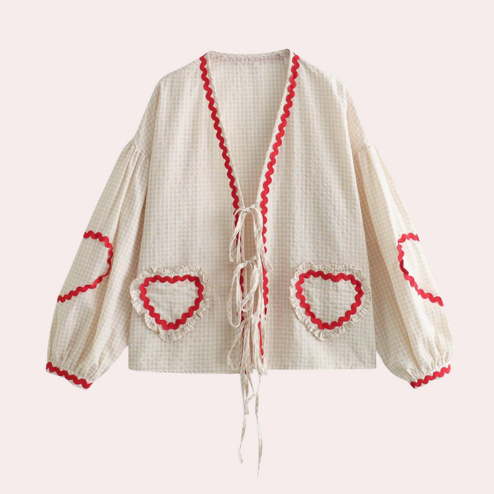<p>Seraphine - Top alla Moda per Donne con Deliziosa Applicazione a Forma di Cuore</p>