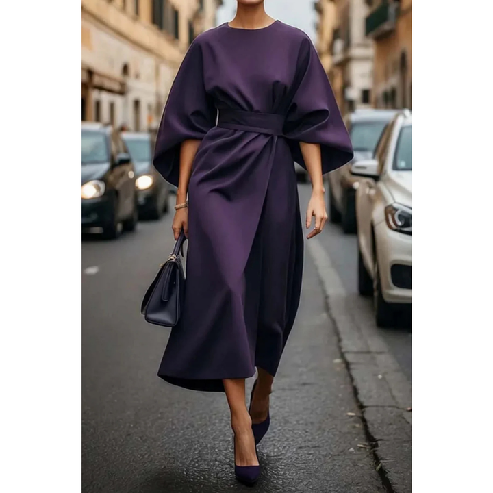<html>
<body>
<p>Selva | Abito elegante con splendidi maniche a lanterna e una cintura che valorizza la silhouette.</p>
</body>
</html>
