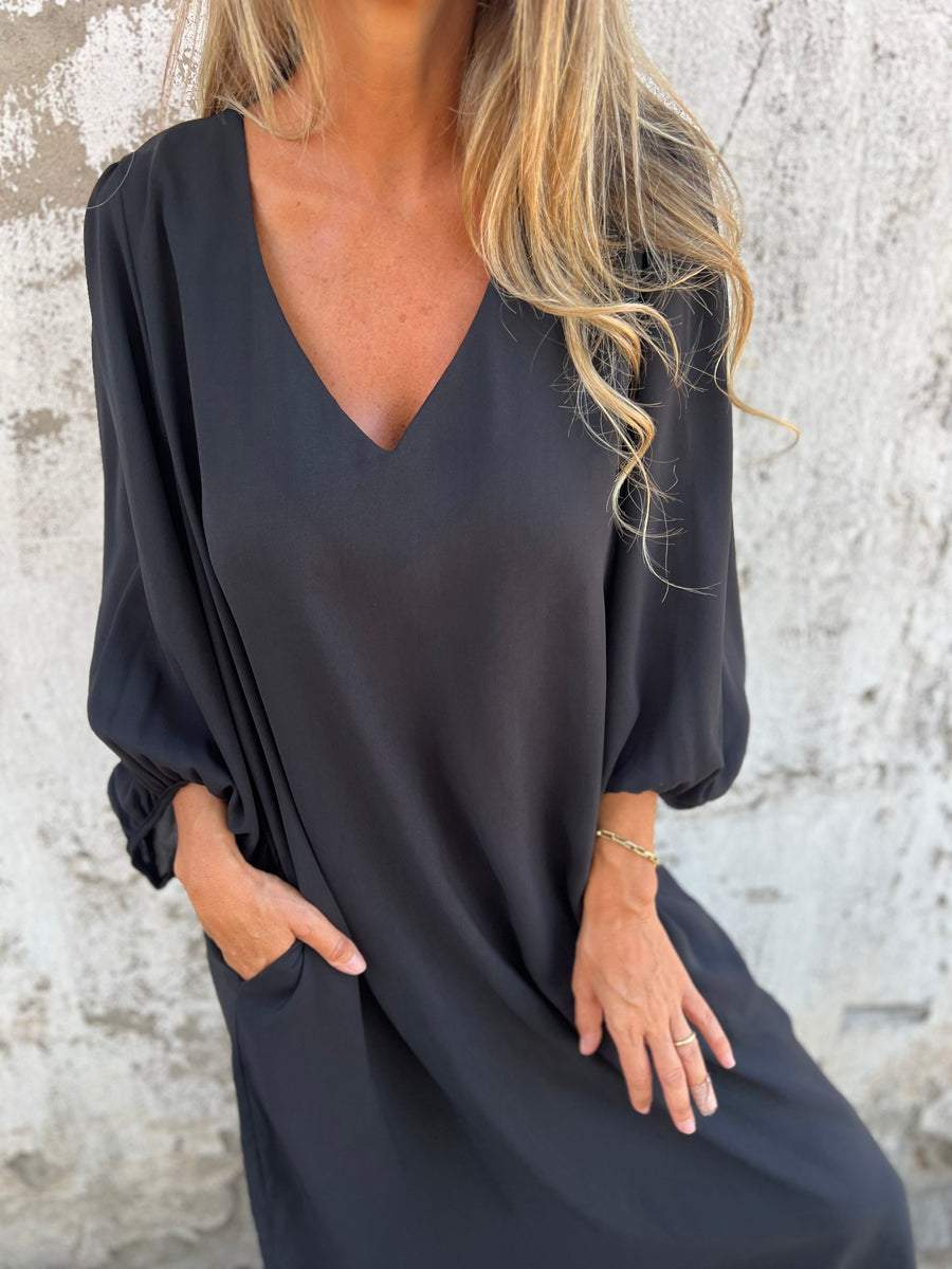 Maxi abito da donna elegante con scollatura a punta - ideale per le occasioni speciali