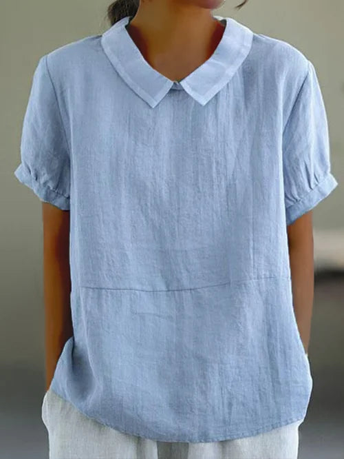 Elegante blusa da donna in lino con maniche a buccia d'arancia e colletto classico