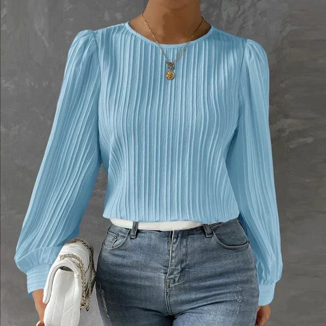 Elegante camicetta da donna plissettata ideale per le occasioni speciali