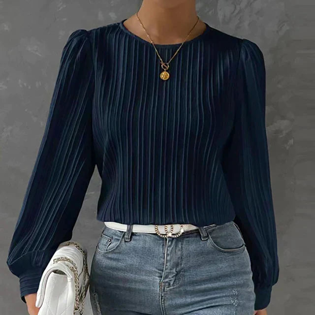 Elegante camicetta da donna plissettata ideale per le occasioni speciali