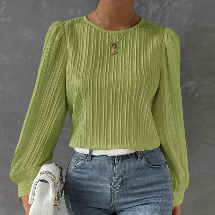Elegante camicetta da donna plissettata ideale per le occasioni speciali