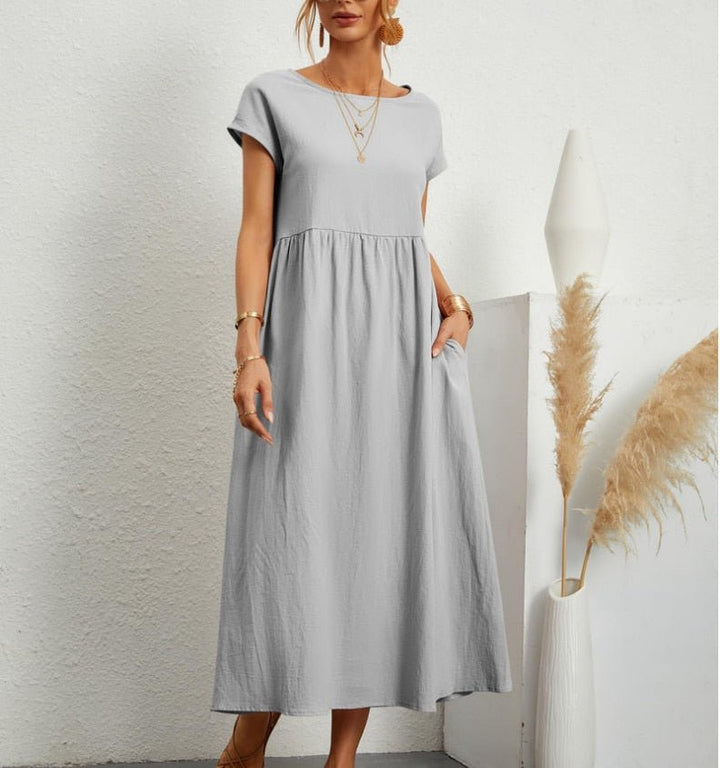 <html><body>Elara - Abito Estivo Elegante con Taglio Libero di Lusso</body></html>