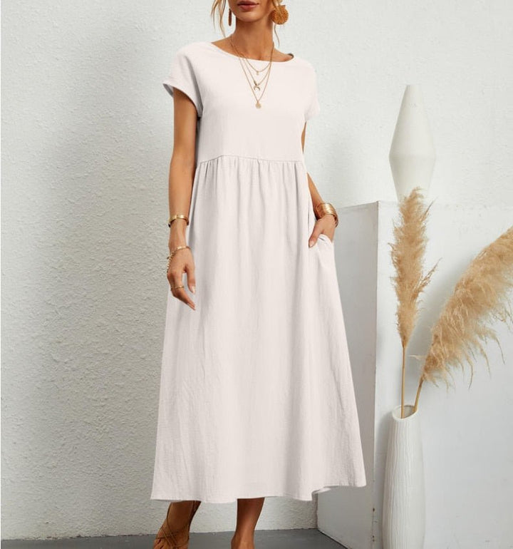 <html><body>Elara - Abito Estivo Elegante con Taglio Libero di Lusso</body></html>