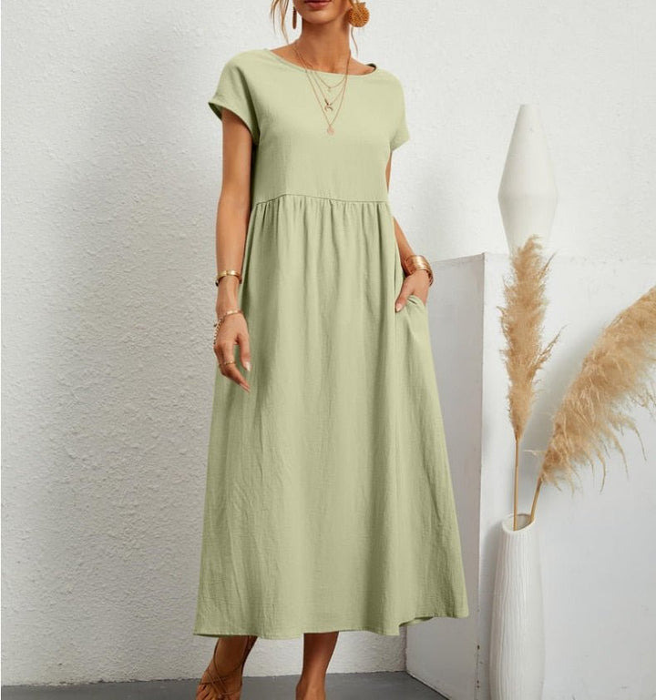 <html><body>Elara - Abito Estivo Elegante con Taglio Libero di Lusso</body></html>
