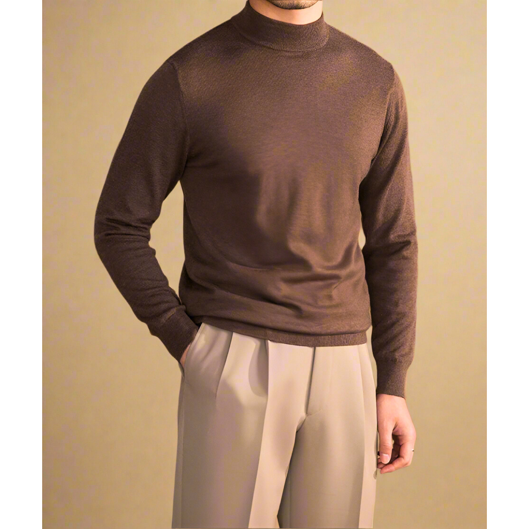 Elegante e confortevole, il maglione dolcevita da uomo in lana pregiata è un classico senza tempo per ogni occasione.