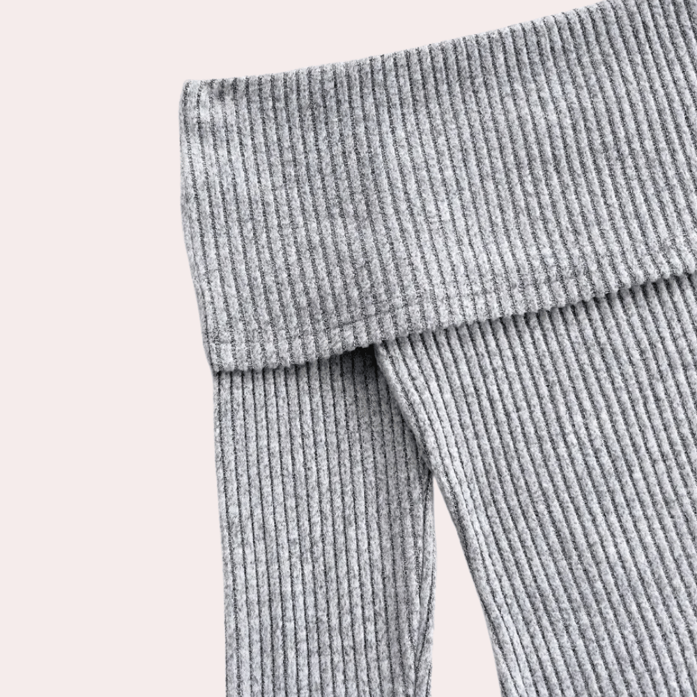 <p>Autunno - Rottura alla moda in maglia a coste scollata</p>