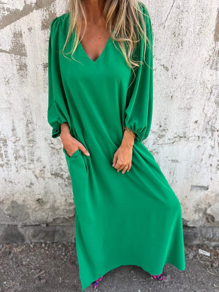 Maxi abito da donna elegante con scollatura a punta - ideale per le occasioni speciali