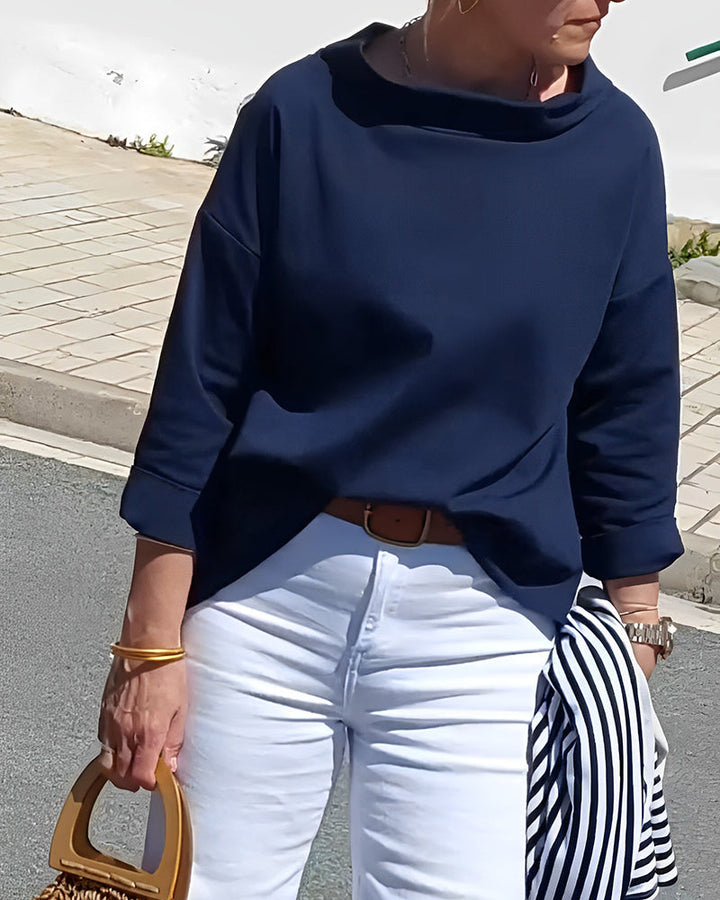 Elegante blusa da donna con maniche a 3/4 e ampio scollo a barca, perfetta per ogni occasione