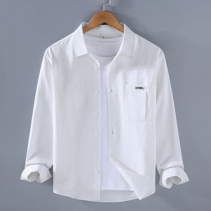 Elegante camicia retrò da uomo a maniche lunghe in morbido cotone con funzionale tasca sul petto