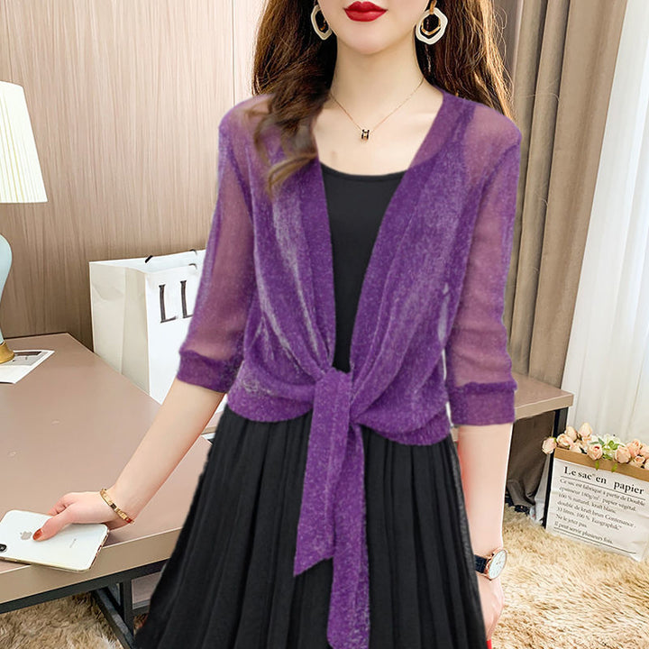 <div>Katie – Blusa Elegante con Apertura Fresca sul Davanti</div>